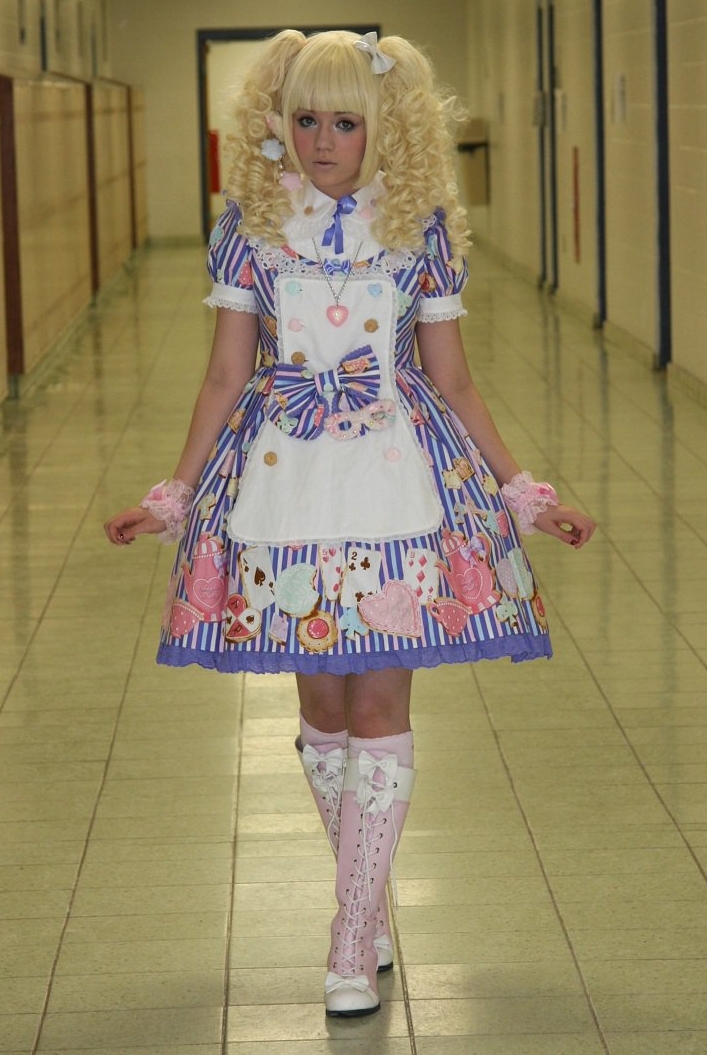 Blonde Lolita with Bare Legs wearing Colored Short Dress and Pink Boots